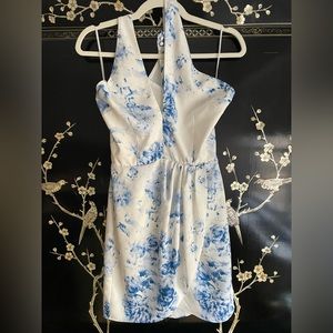 Cute summer mini dress with crossover neckline and peekaboo back